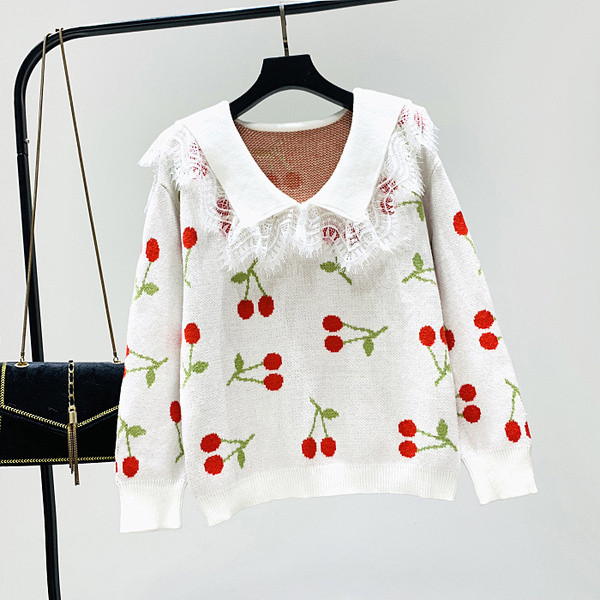 Új modell női pulóver spitz nyakkivágással és fehér, fekete, rózsaszín és kék mintával