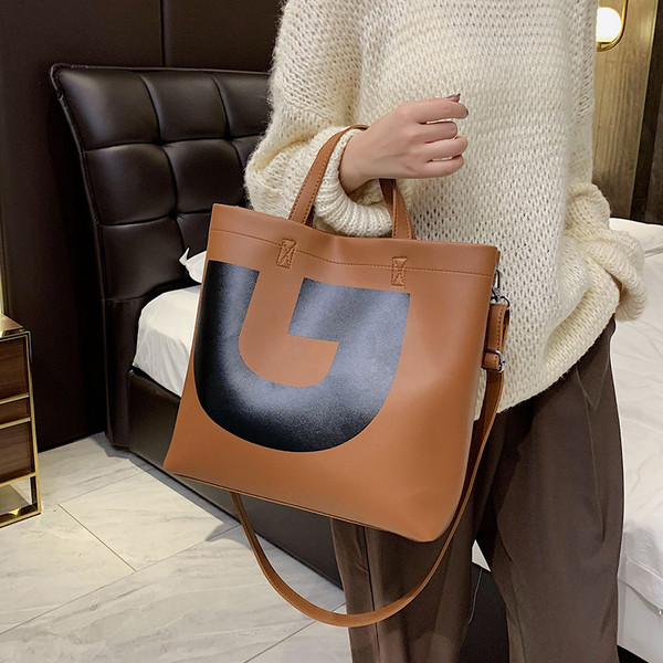 Modern női táska eko bőrből, hosszú és rövid fülekkel