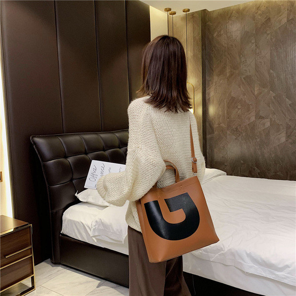 Modern női táska eko bőrből, hosszú és rövid fülekkel