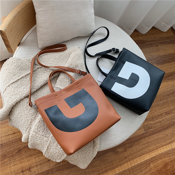 Modern női táska eko bőrből, hosszú és rövid fülekkel