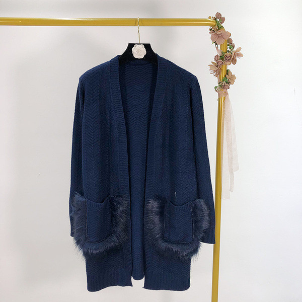 Hosszú női mellény rögzítés nélkül, zsebekkel és pehellyel