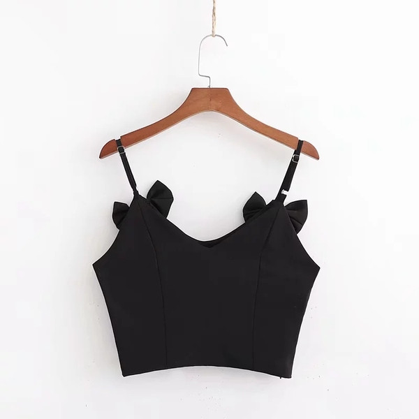 Rövid női felső vékony pántokkal és fekete szalagokkal