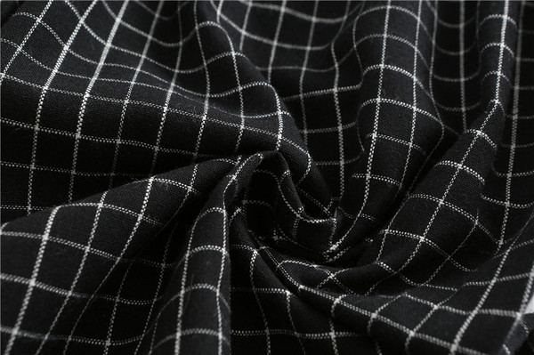 Modern női kockás nadrág magas derékkal és zsebekkel