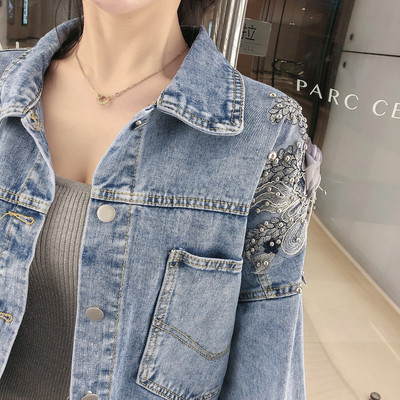 Női széles farmerdzseki kék színben, 3D elemmel