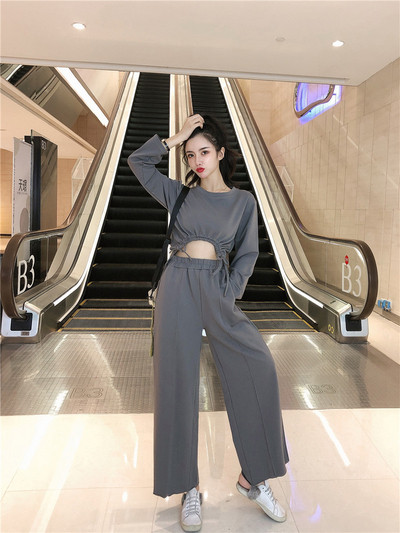 Női lezser szett rövid blúzból és széles nadrágból