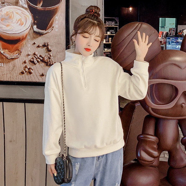 Női alkalmi blúz négy színben, magas gallérral és cipzárral