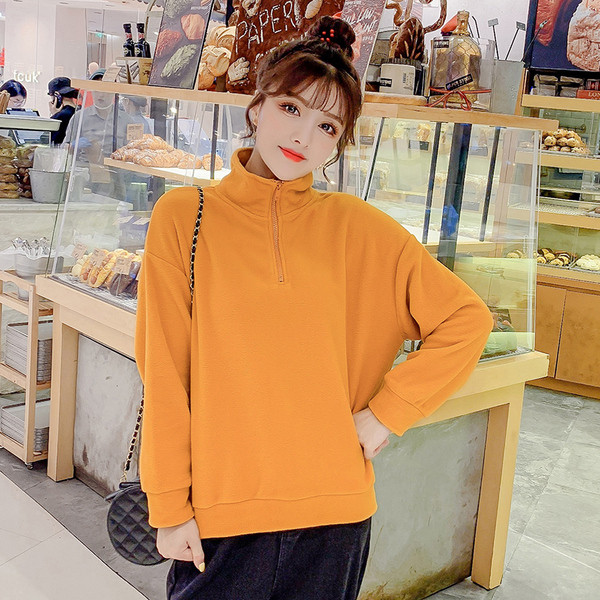 Női alkalmi blúz négy színben, magas gallérral és cipzárral