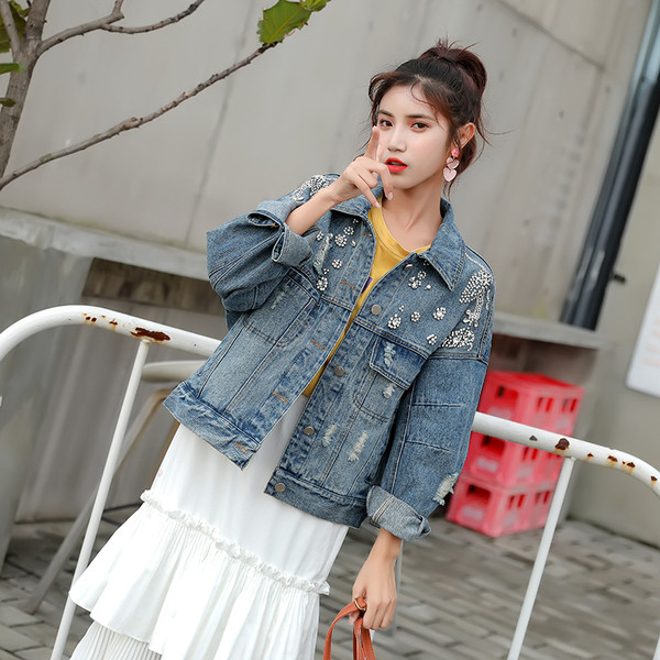 Széles modell női farmerdzseki hímzéssel