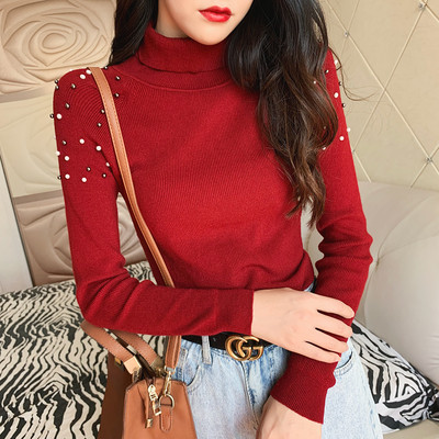 Modern női pulóver gyöngyökkel és magas gallérral