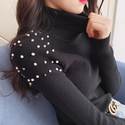 Modern női pulóver gyöngyökkel és magas gallérral