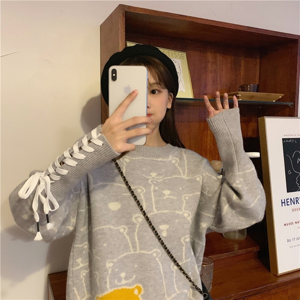 Modern női pulóver két színben nyakkendővel