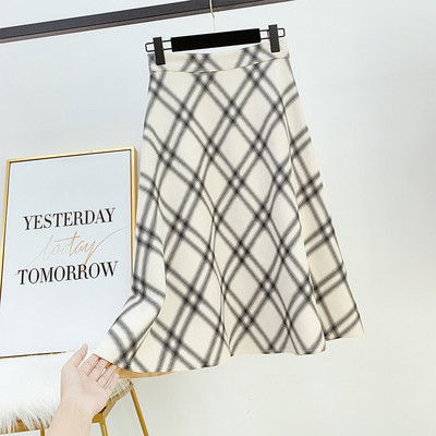 Modern női szoknya magas derékkal, fehér és sárga színben