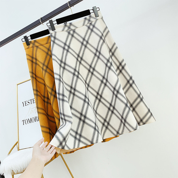 Modern női szoknya magas derékkal, fehér és sárga színben