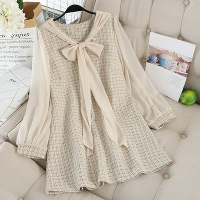 Modern női ruha fekete és bézs színű szalaggal