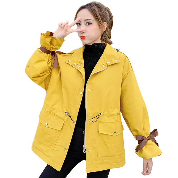 Női alkalmi kabát sárga színben, magas gallérral