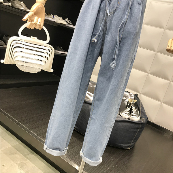 Blugi de dama cu talie inalta si cravate intr-o culoare deschisa