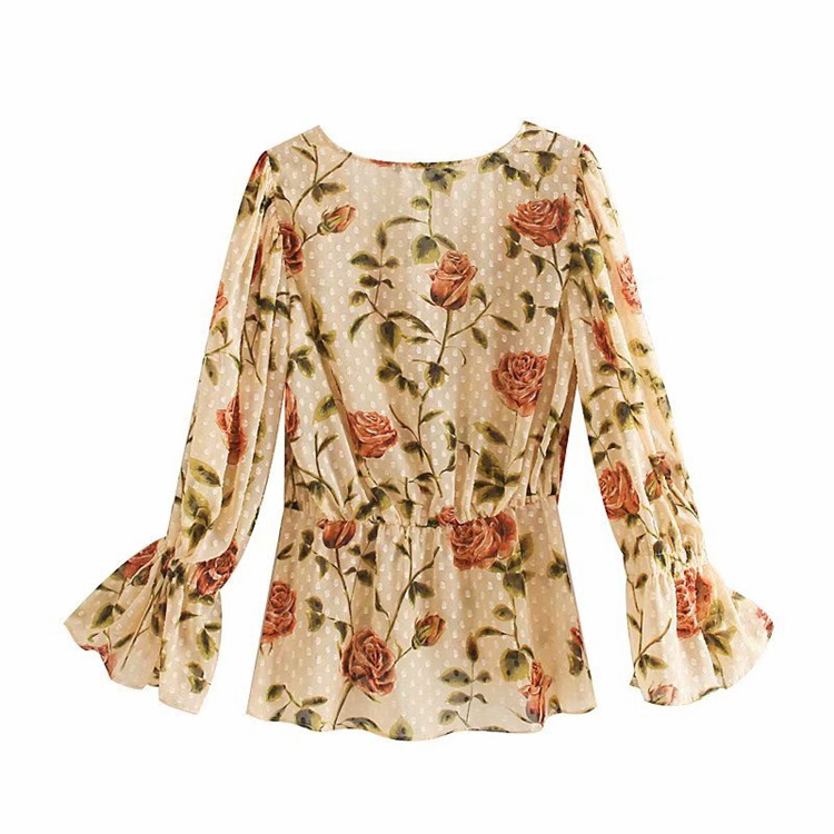 Női ing mély spitz nyakkivágással és világos színű gombokkal