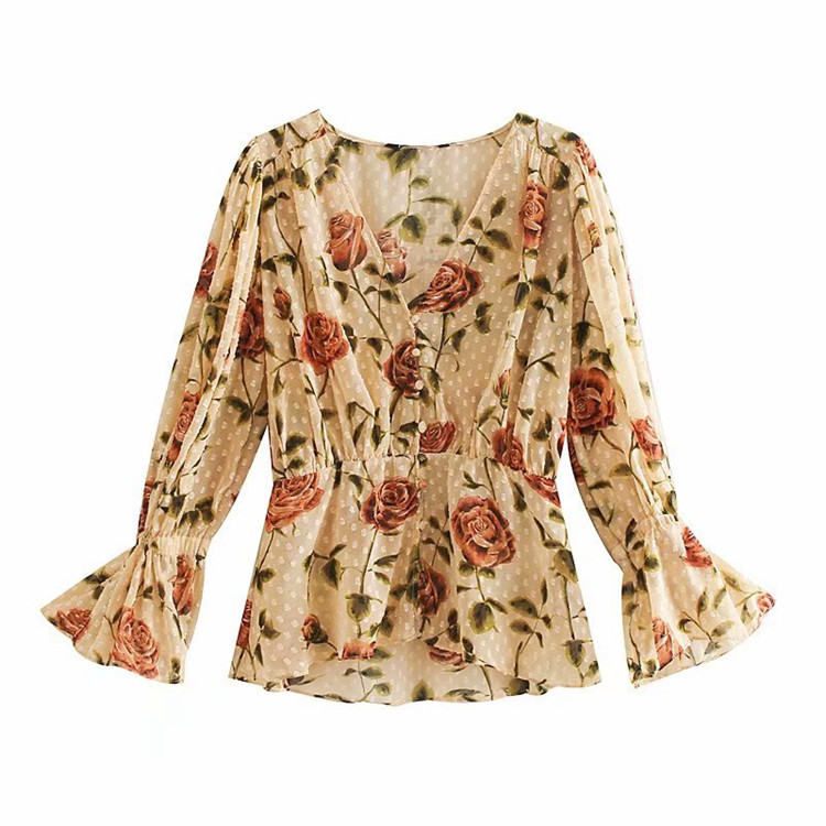 Női ing mély spitz nyakkivágással és világos színű gombokkal