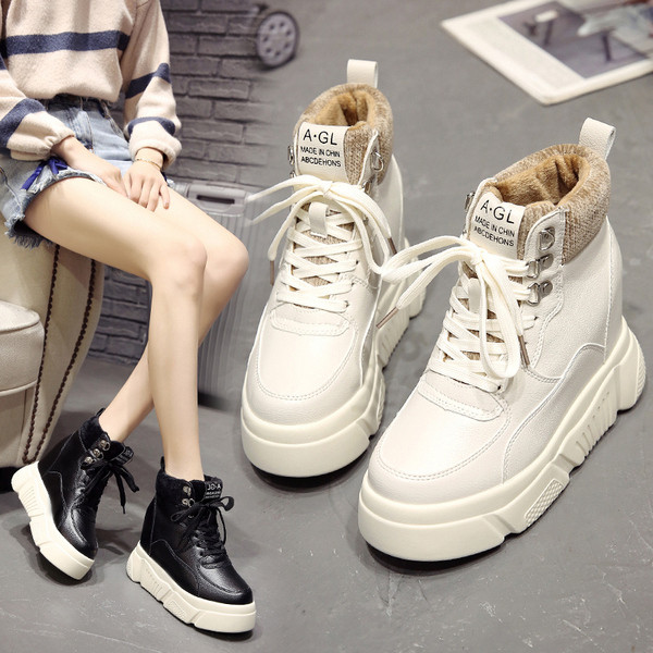 Női téli tornacipő puha béléssel és fűzős fehér és fekete színben