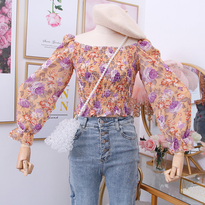 Új modell női blúz csupasz váll és virágmintás több színben