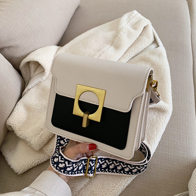 Eko bőrből készült modern női táska hosszú füllel