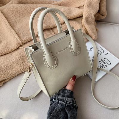 Modern női bőrtáska két füllel, többféle színben