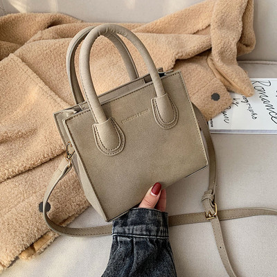 Modern női bőrtáska két füllel, többféle színben