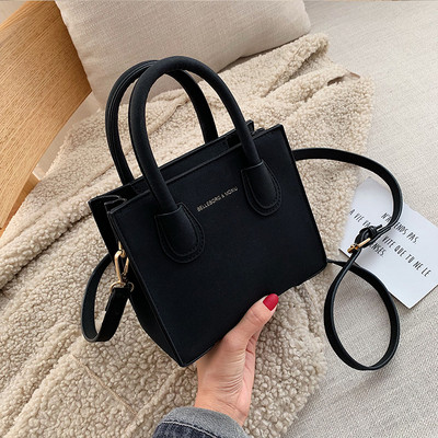 Modern női bőrtáska két füllel, többféle színben