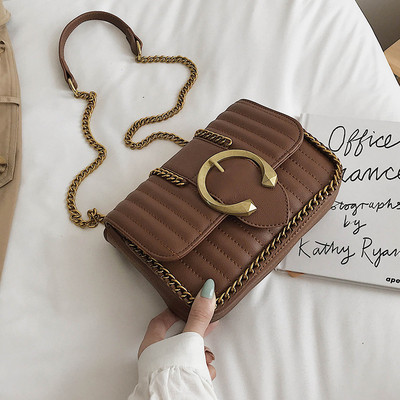 Geanta de dama cu element metalic si lant in mai multe culori