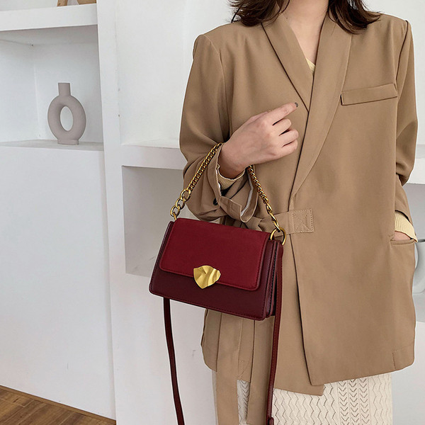 Láncos, hosszú füles női táska többféle színben