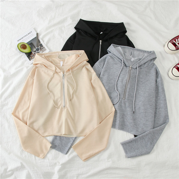 Női alkalmi pulóver kapucnival és cipzárral több színben