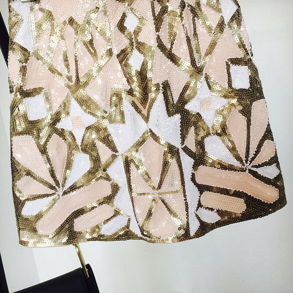 Aktuális női szoknya flitter elemekkel, magas derékkal