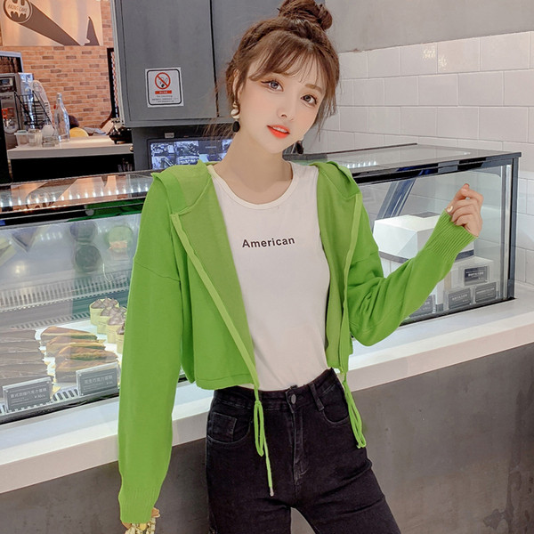 Női alkalmi rövid pulóver nyakkendővel és cipzárral