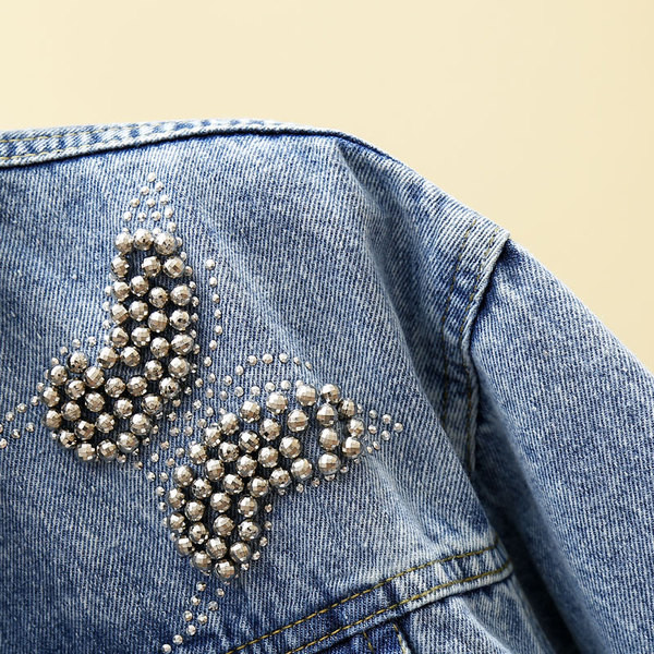 Női farmerdzseki fekete és kék pillangókkal