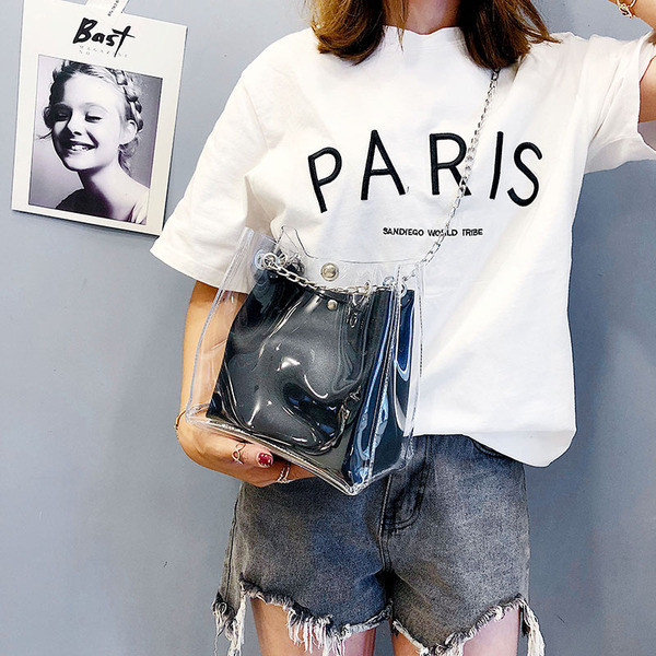 Διαφανή γυναικεία τσάντα με μεγάλες μεταλλικές χειρολαβές σε κόκκινο, λευκό και μαύρο χρώμα