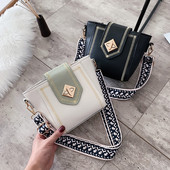 Modern női táska hímzett elemekkel és vastag fogantyúval