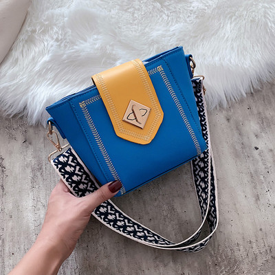 Modern női táska hímzett elemekkel és vastag fogantyúval