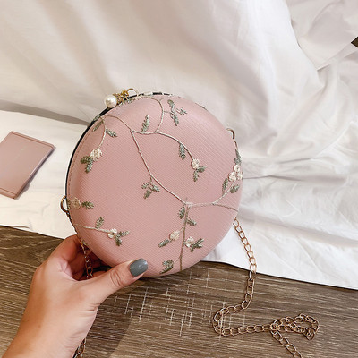 Női kerek táska hímzéssel és hosszú füllel hat színben