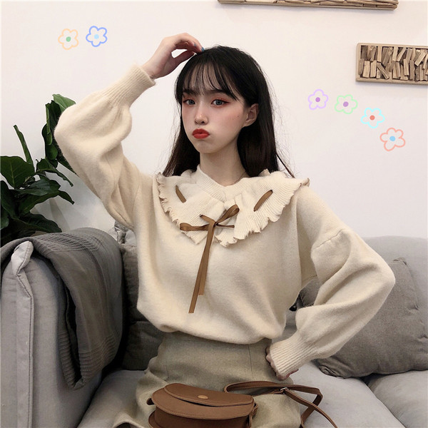 Bluză de damă modernă cu decolteu spitz în două culori