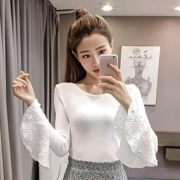 Modern női blúz lótusz ujjal és gyöngyökkel több színben