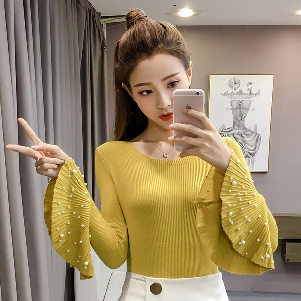 Modern női blúz lótusz ujjal és gyöngyökkel több színben