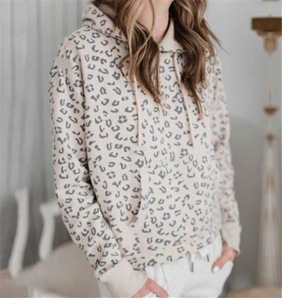 Modern női pulóver nyakkendővel és állatmintával