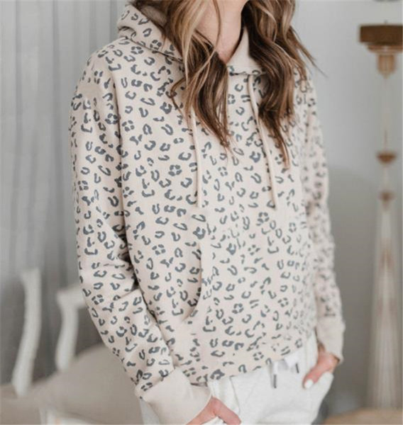 Modern női pulóver nyakkendővel és állatmintával