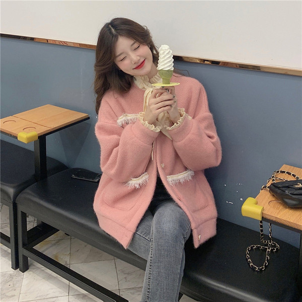 Modern női kardigán rózsaszín színű zsebekkel és magas gallérral