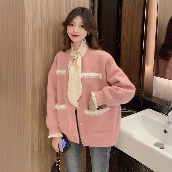 Modern női kardigán rózsaszín színű zsebekkel és magas gallérral