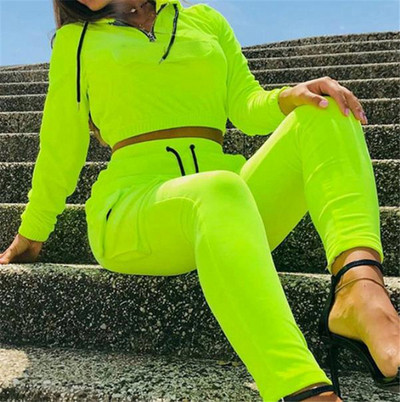 Модерен дамски спортен екип от две части с връзки в два цвята