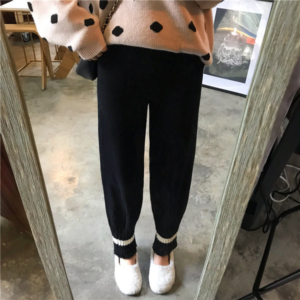 Fekete színű női kötött nadrág