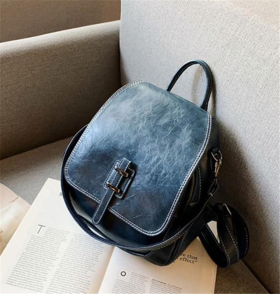 Modern női hátizsák öko bőrből három színben és fém elemmel