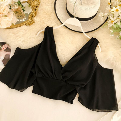 Modern női felső csupasz vállrészekkel fehér és fekete színben