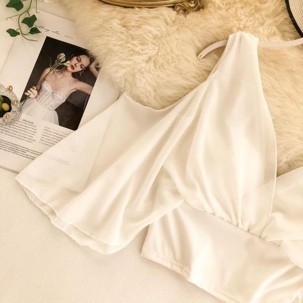 Modern női felső csupasz vállrészekkel fehér és fekete színben